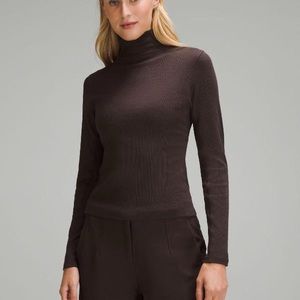 Ribbed Wool-Blend Turtleneck espresso
Size 8